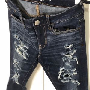 Ripped denim jegging skinny mid rise